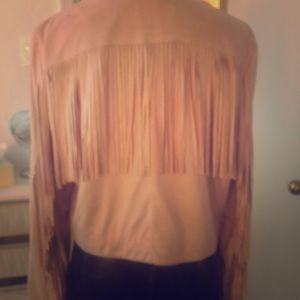 FRINGE FRINGE FRINGE. Faux suede pale pink jacket with fringe.